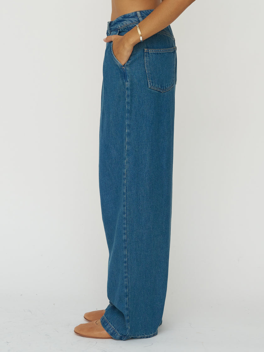 The New Society Pleated Denim Trouser