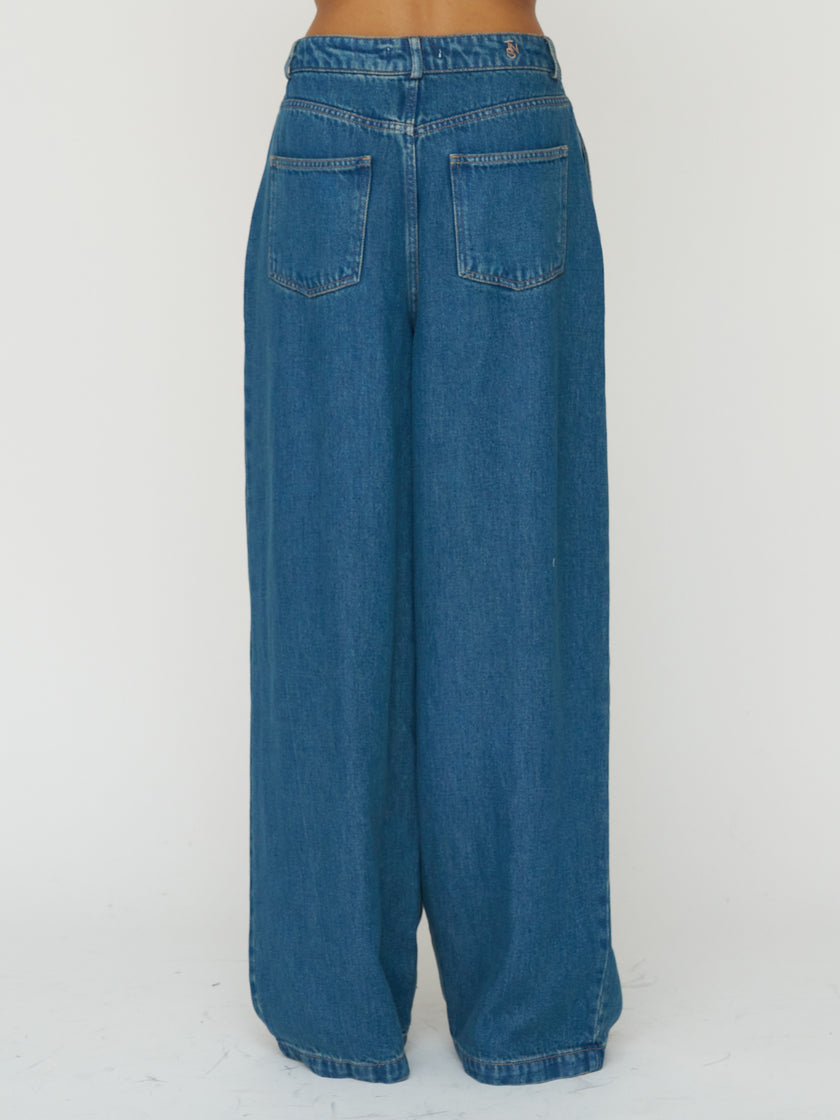 The New Society Pleated Denim Trouser