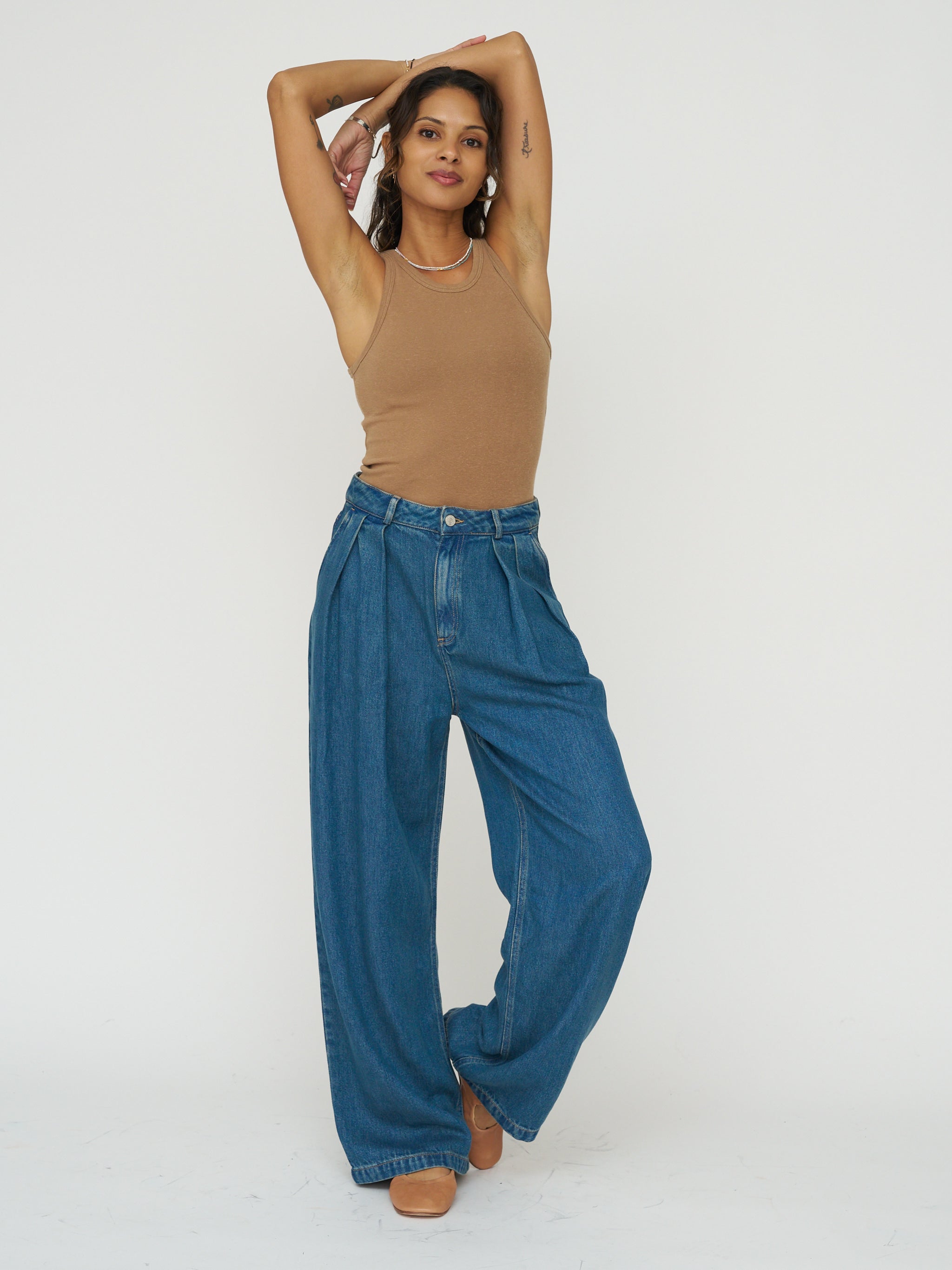 The New Society Pleated Denim Trouser