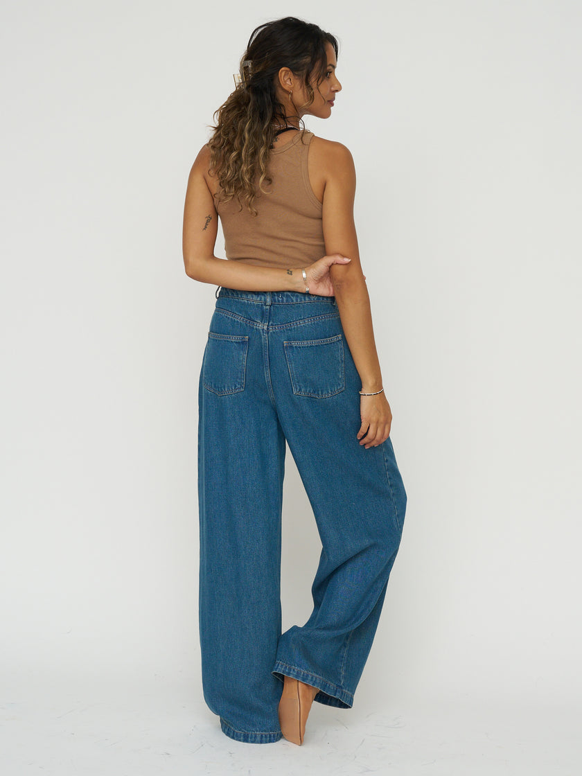 The New Society Pleated Denim Trouser