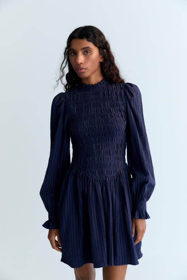 The New Society Smocked Bodice Dress in Infinite Navy