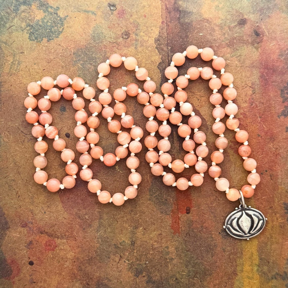 RFB 108 with Erica Molinari Silver Lotus Om Charm and Peach Moonstone